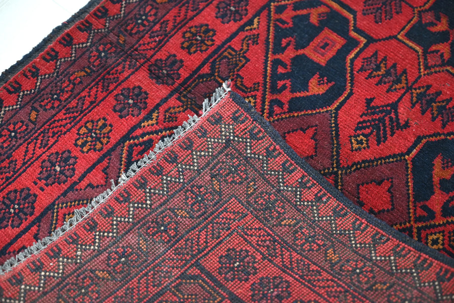 Khal Mohammadi Afghan Rug – Garnet Emblem