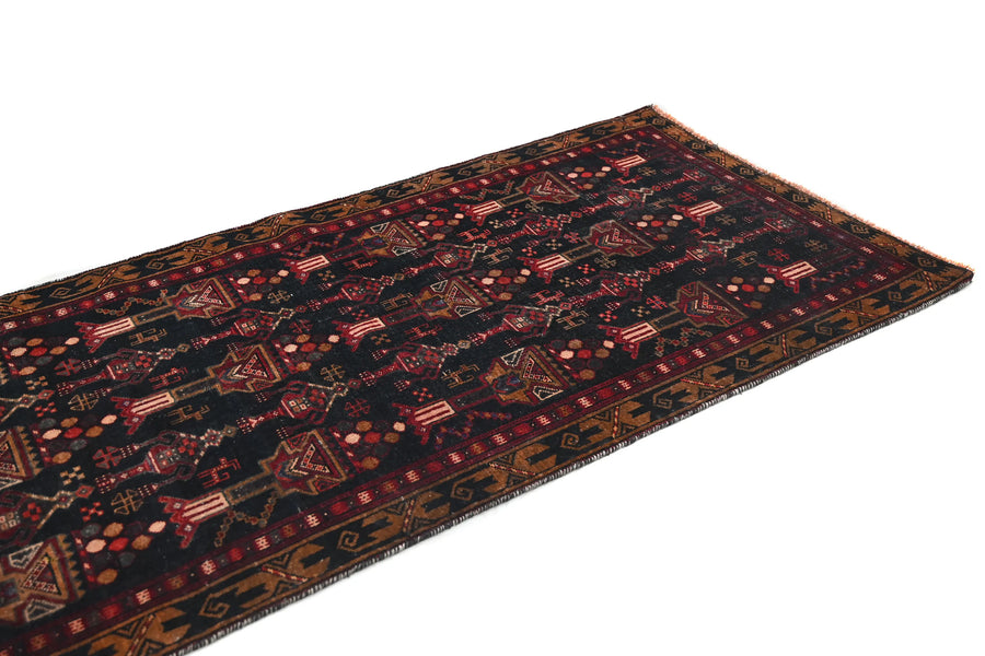 Vintage Baluchi Runner – Obsidian Obelisk