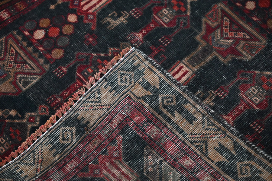 Vintage Baluchi Runner – Obsidian Obelisk